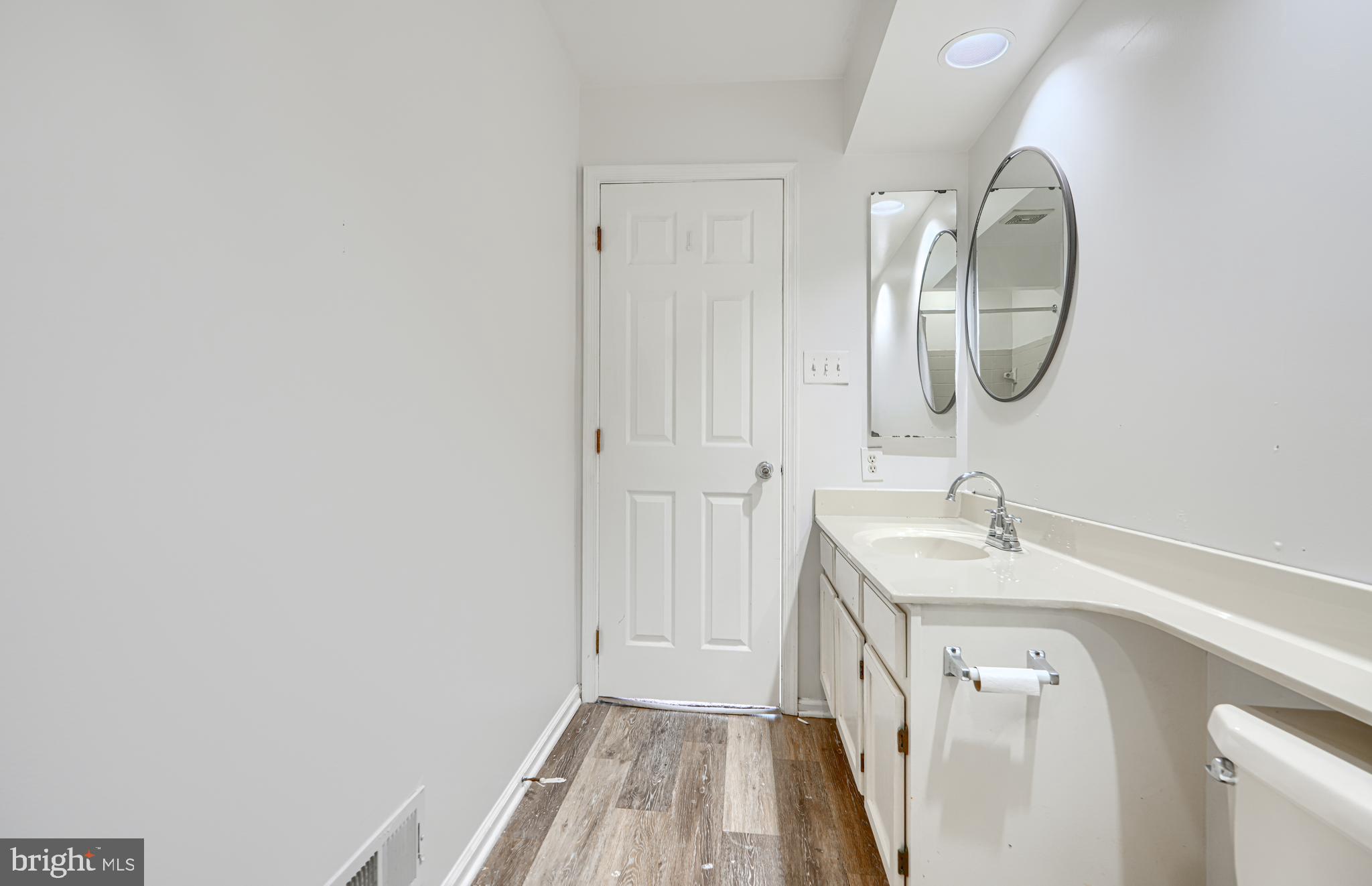 315 Overlea Place Abingdon, MD 21009 - Photo 38 of 56 a bathroom with a sink and a mirror
