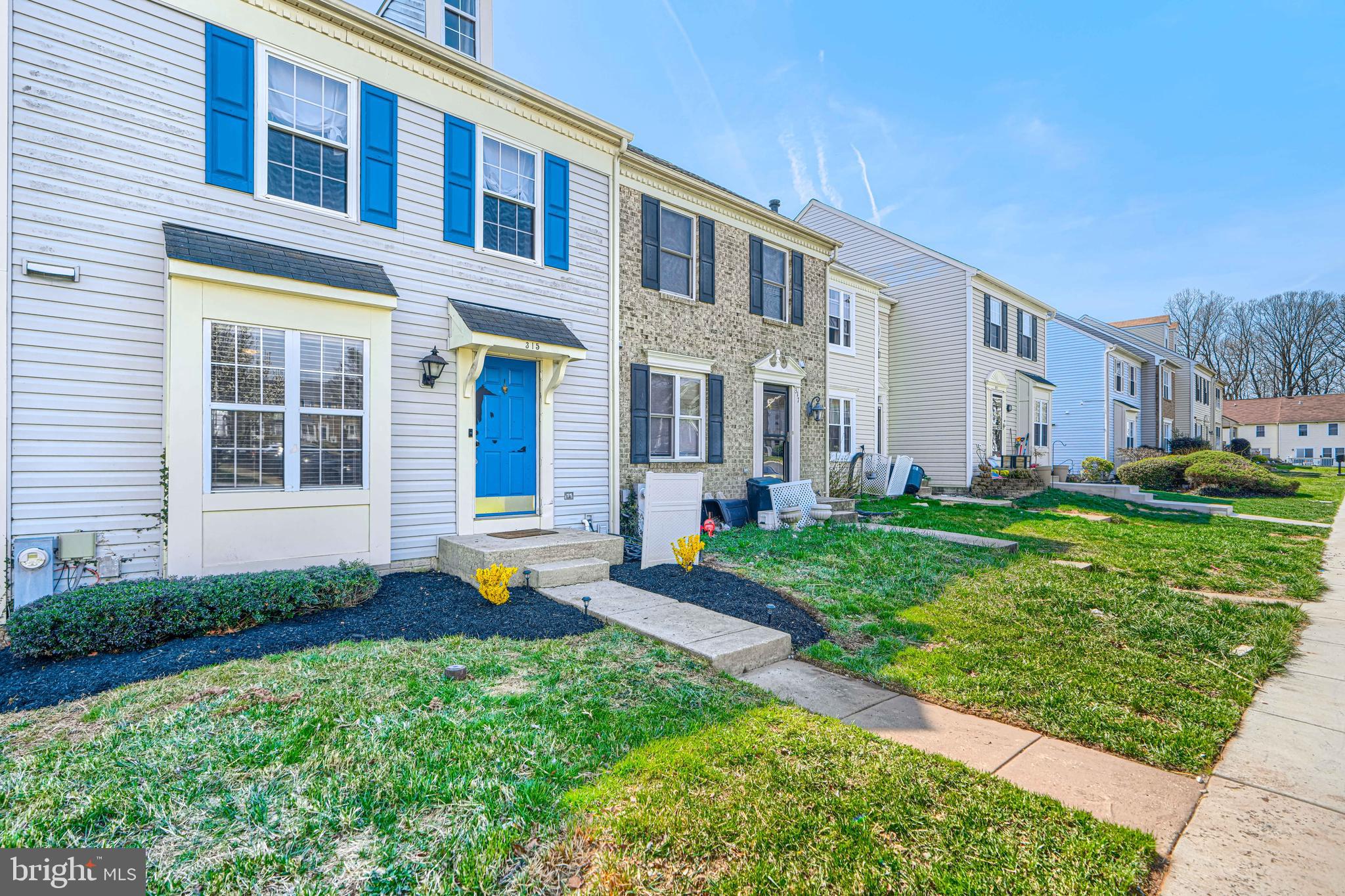 315 Overlea Place Abingdon, MD 21009 - Photo 4 of 56 a front view of a house with a yard and outdoor seating