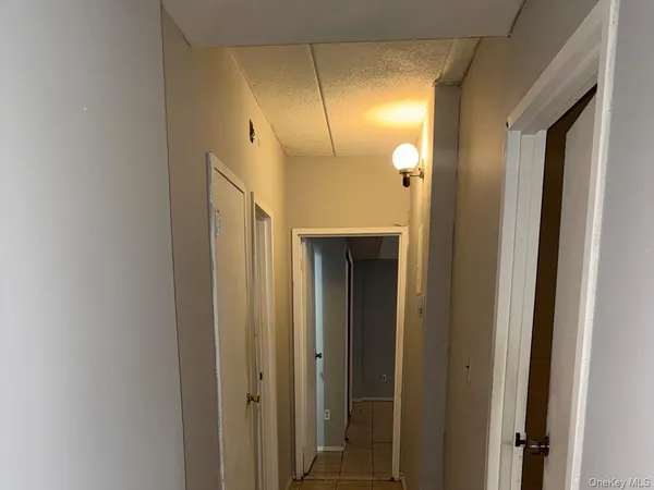 a bathroom with a mirror and a shower