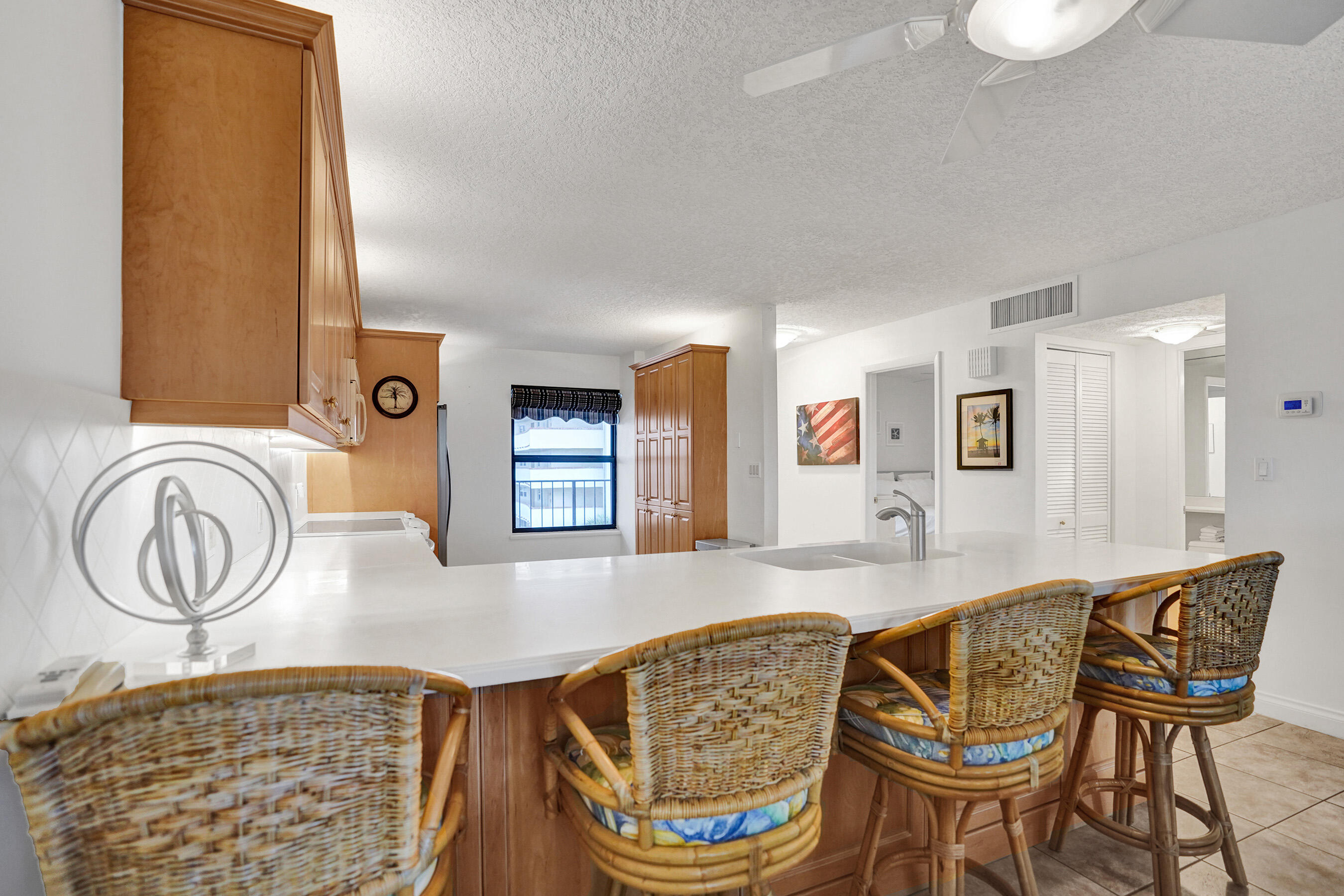 1627 Riverview Road, Unit 410 Deerfield Beach, FL 33441 - Photo 14 of 56 a dining room with furniture and a table