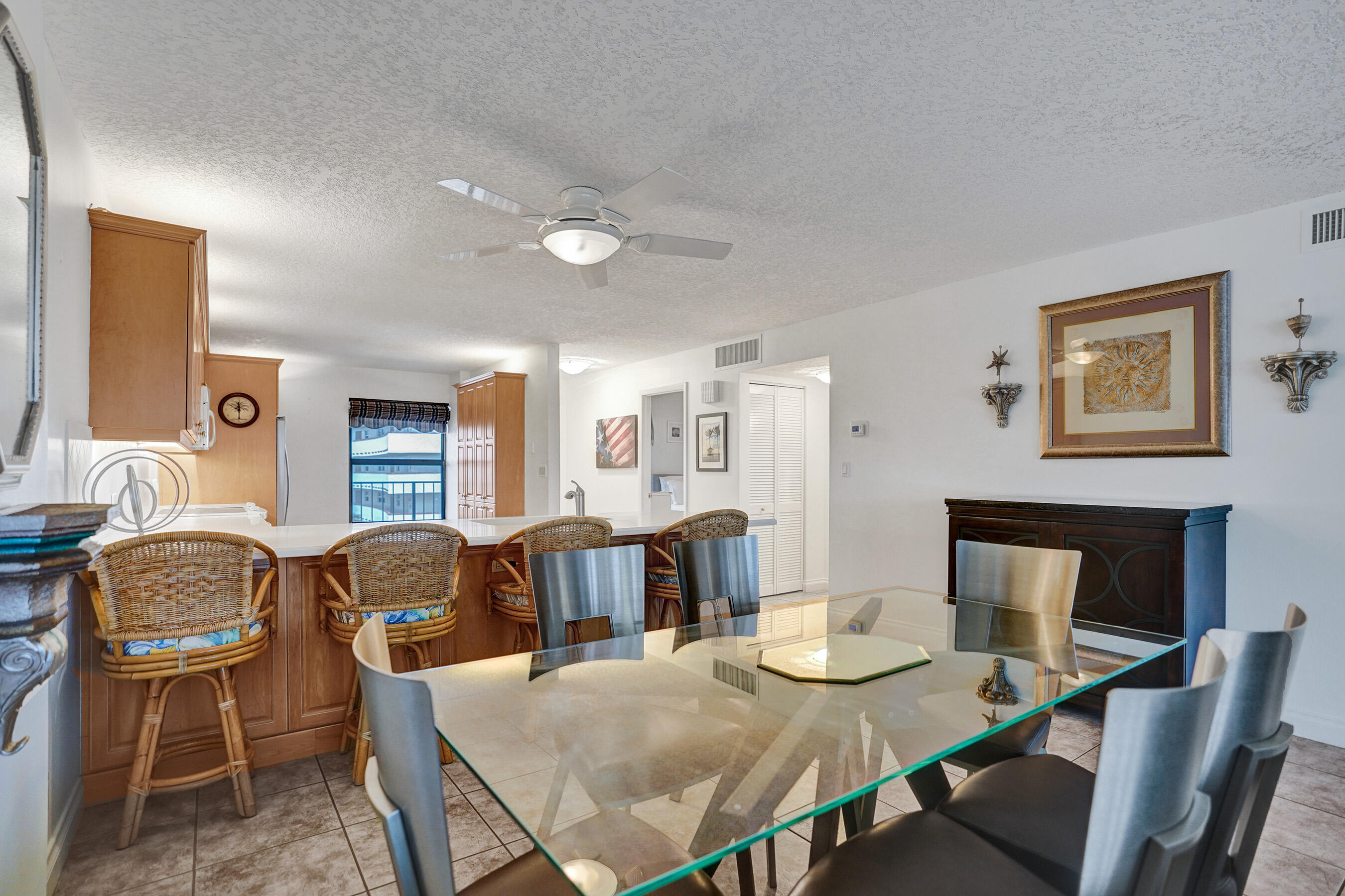 1627 Riverview Road, Unit 410 Deerfield Beach, FL 33441 - Photo 25 of 56 a view of a dining room with furniture