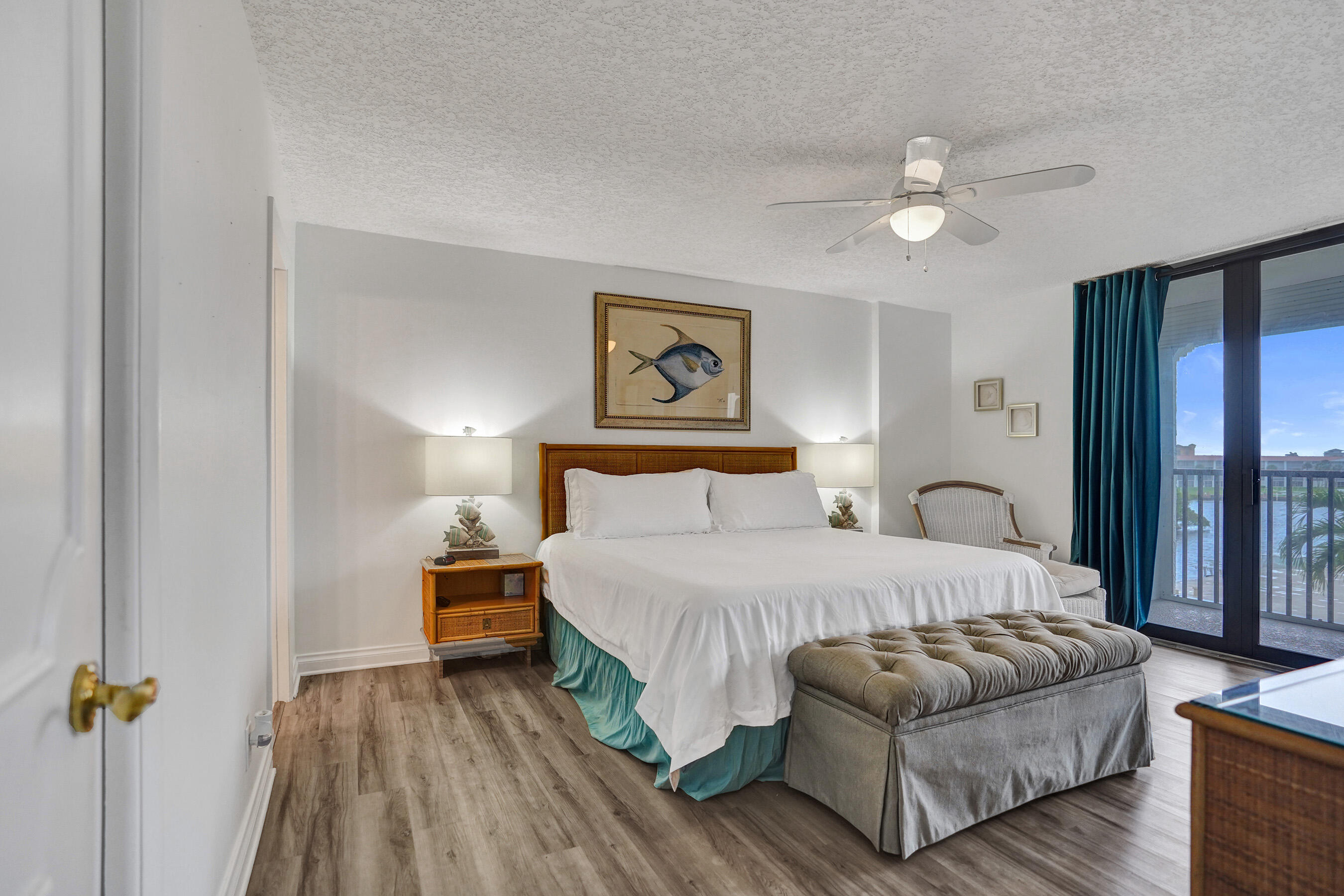 1627 Riverview Road, Unit 410 Deerfield Beach, FL 33441 - Photo 39 of 56 a bedroom with a bed and a couch