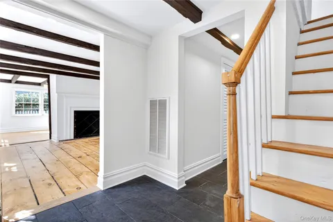 a view of an entryway with staircase