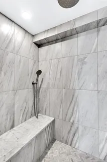 a bathroom with a sink and a shower