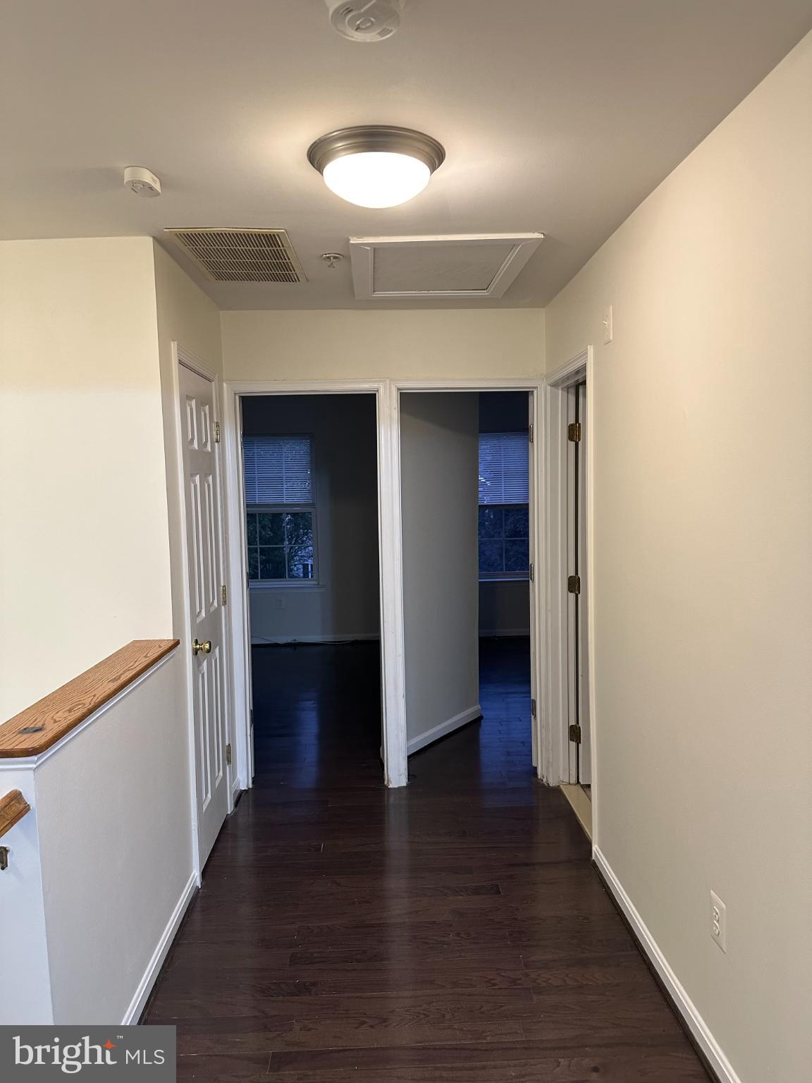 11130 Hollowbrook Road Owings Mills, MD 21117 - Photo 13 of 27 Inviting hallway with warm wooden accents.