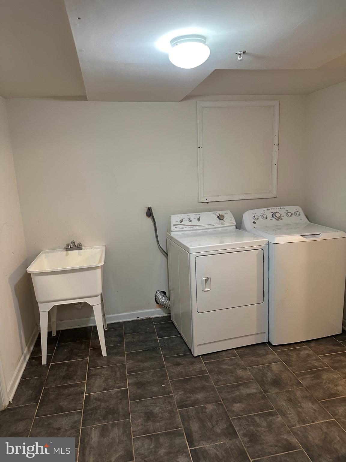 11130 Hollowbrook Road Owings Mills, MD 21117 - Photo 19 of 27 Bright and functional laundry space.