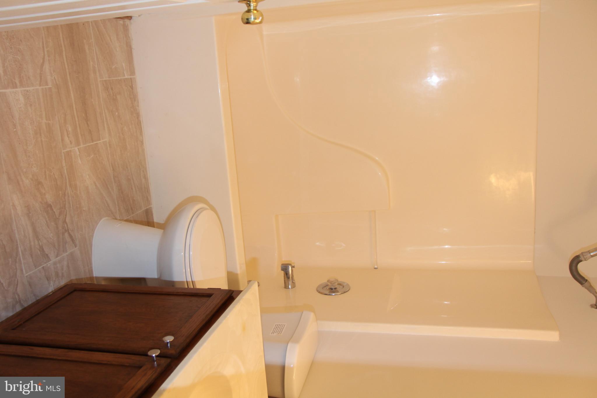 11130 Hollowbrook Road Owings Mills, MD 21117 - Photo 22 of 27 Modern bathroom with sleek finishes.