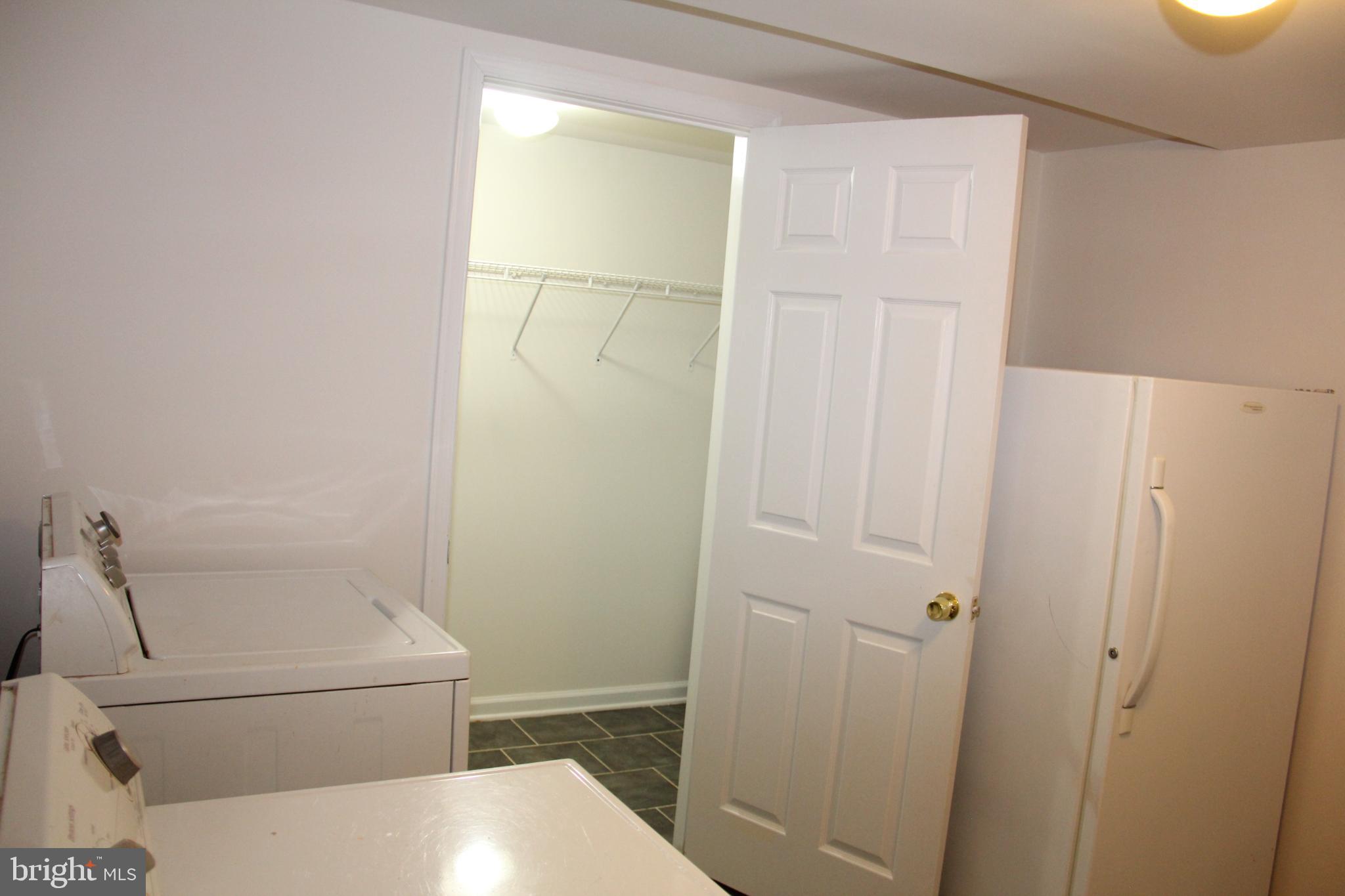 11130 Hollowbrook Road Owings Mills, MD 21117 - Photo 24 of 27 Bright and functional laundry space.
