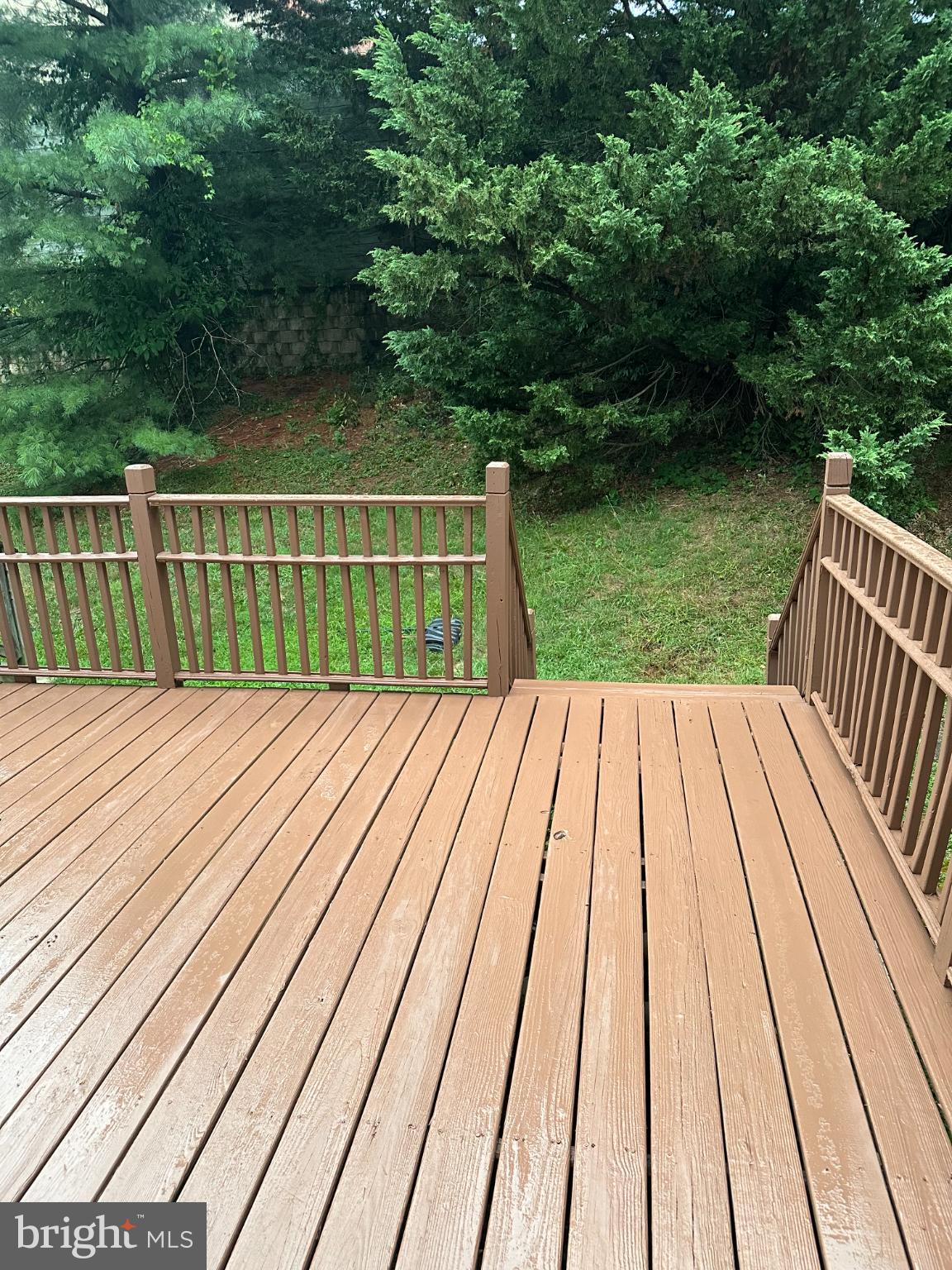 11130 Hollowbrook Road Owings Mills, MD 21117 - Photo 27 of 27 Serene deck overlooking lush greenery.