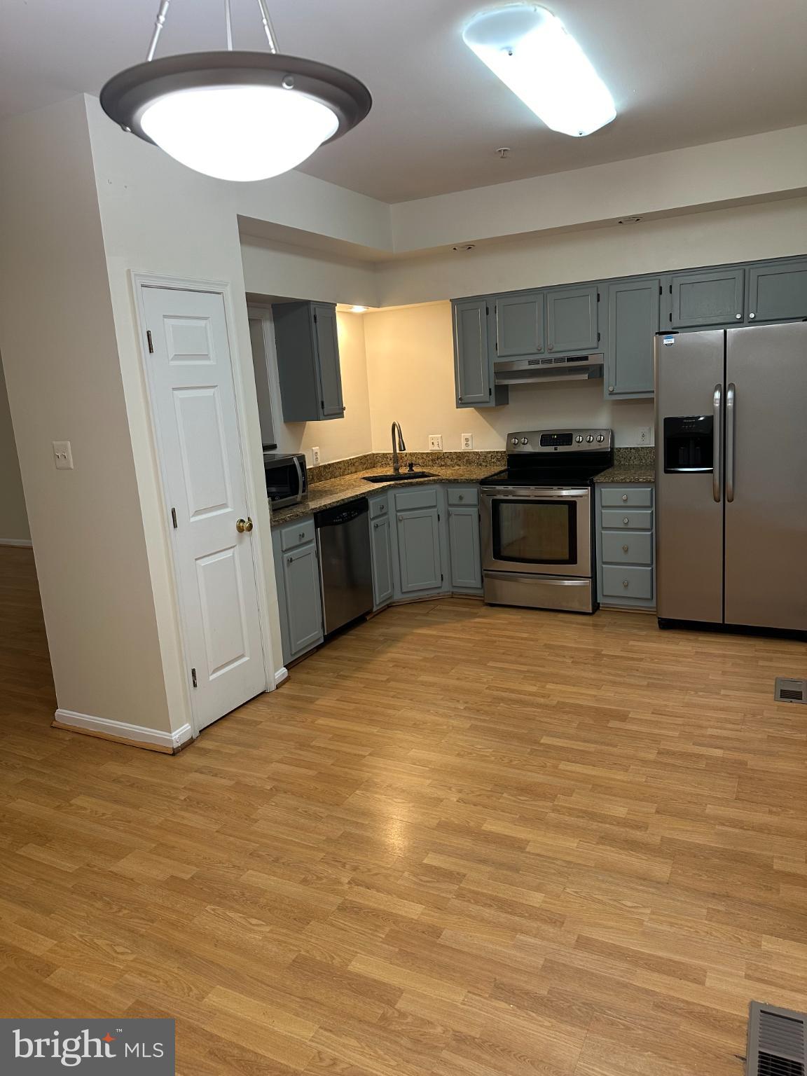 11130 Hollowbrook Road Owings Mills, MD 21117 - Photo 6 of 27 Modern kitchen with sleek cabinetry.