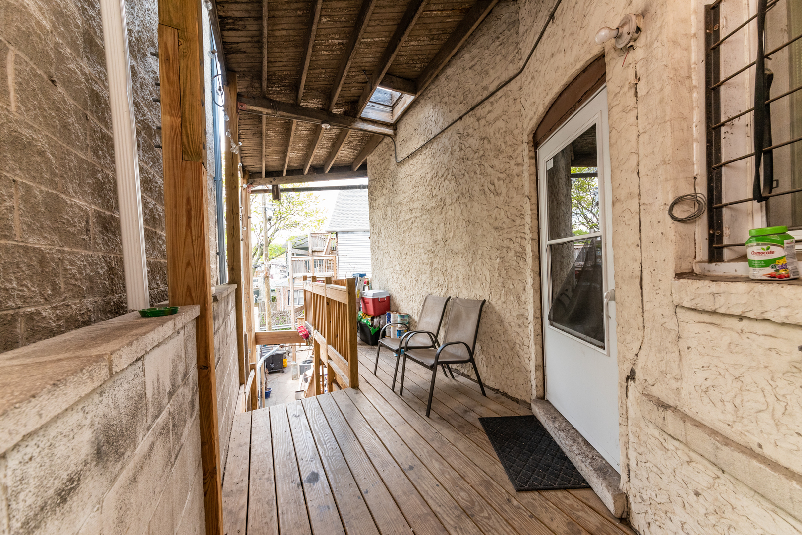 4128 North Lincoln Avenue, Unit 2R Chicago, IL 60618 - Photo 16 of 16 a balcony with chairs and wooden floor