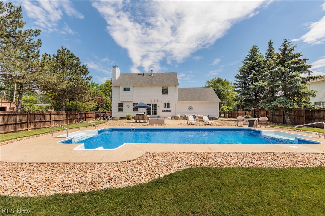 View of pool with a patio area