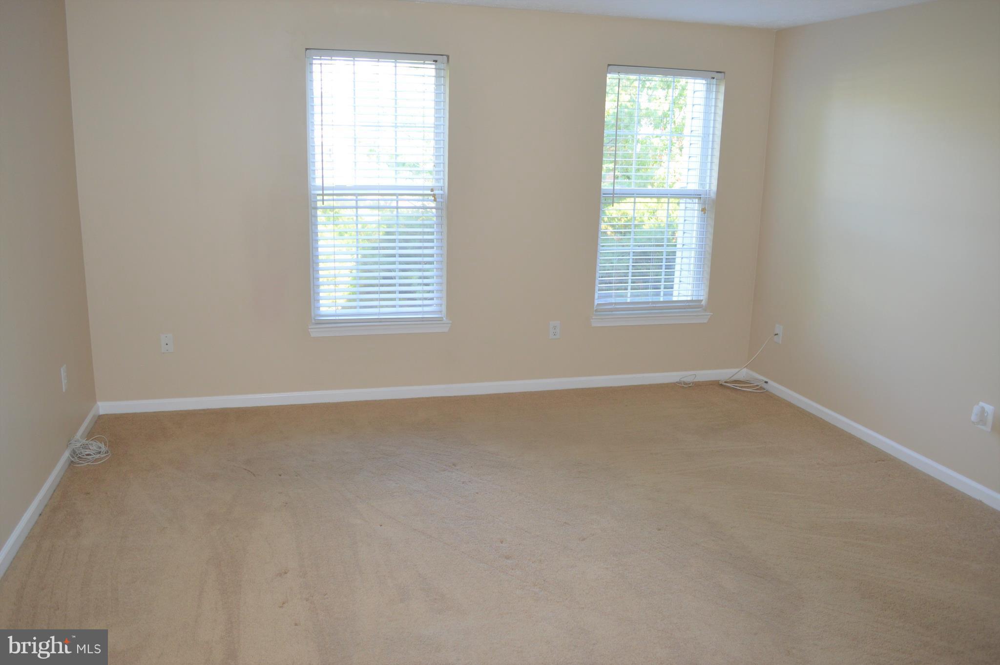 2440 Blue Spring Court, Unit 202 Odenton, MD 21113 - Photo 14 of 23 Master Bedroom