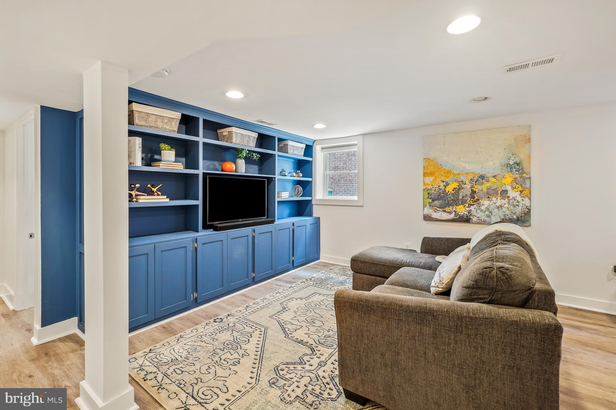 113 Webster Street Northwest Washington, DC 20011 - Photo 26 of 36 Lower level family room with custom built-ins