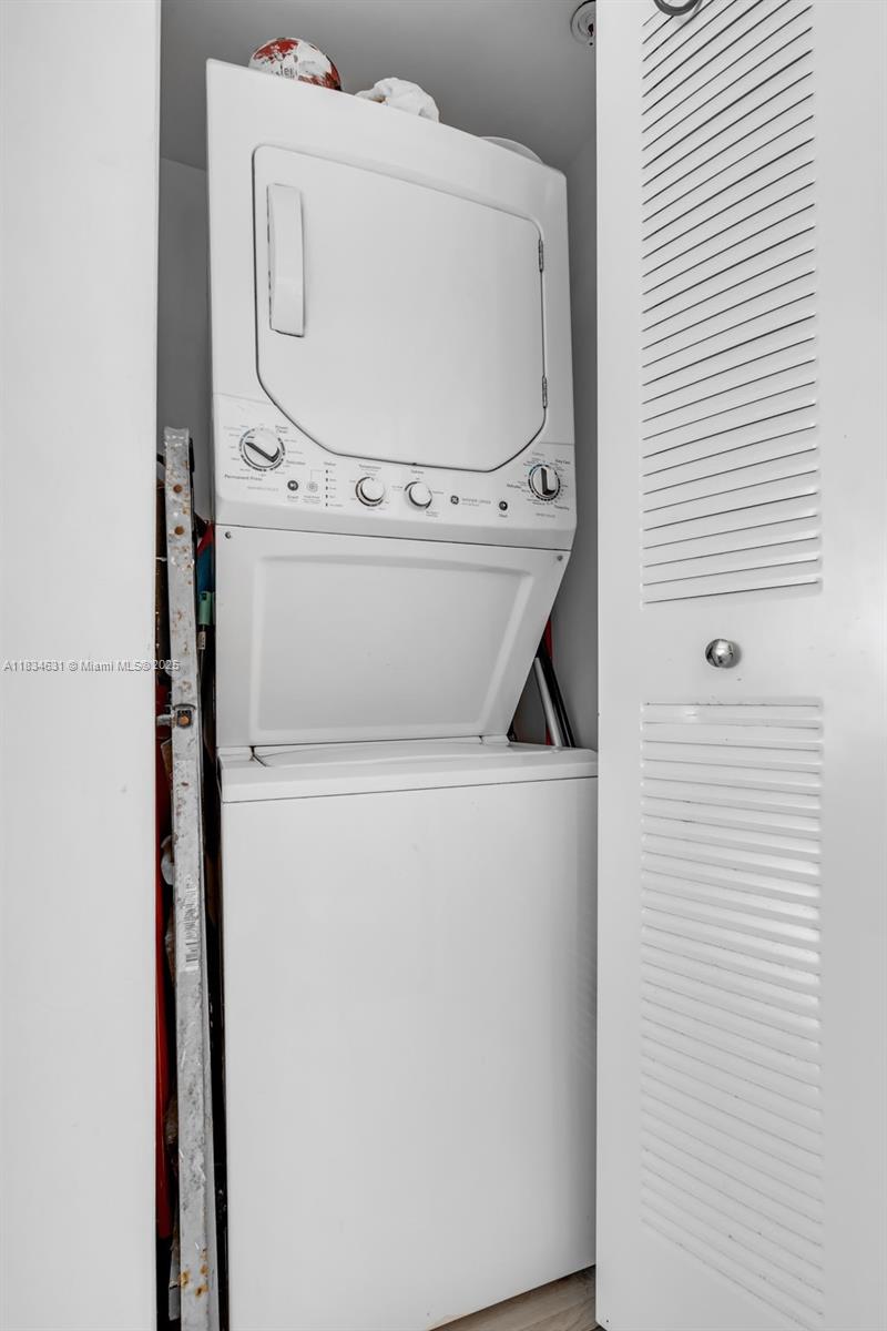 1450 Meridian Avenue, Unit 202 Miami Beach, FL 33139 - Photo 15 of 29 a close up view of a washer and dryer