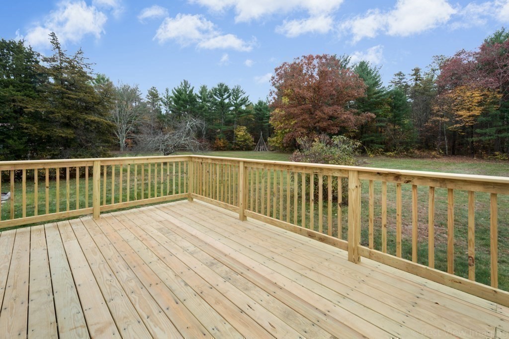 66 Ruggles Street Hardwick, MA 01031 - Photo 34 of 37 a view of wooden deck and a garden