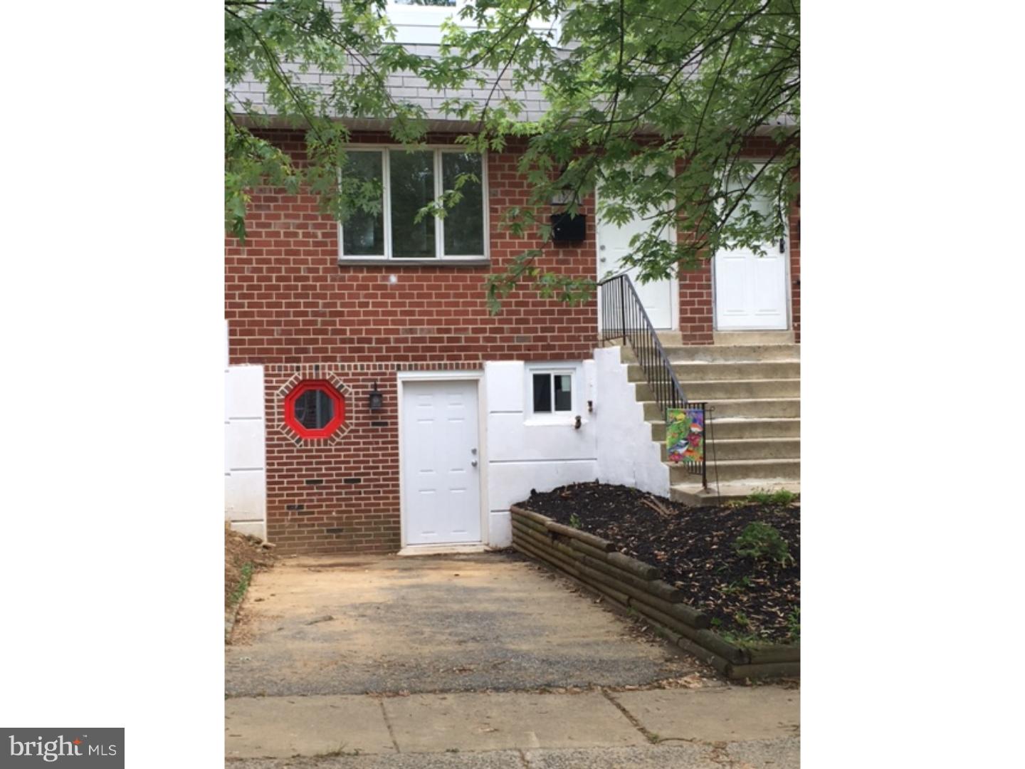 1341 Rainer Road Brookhaven, PA 19015 - Photo 17 of 23 a view of a house with a backyard and trees