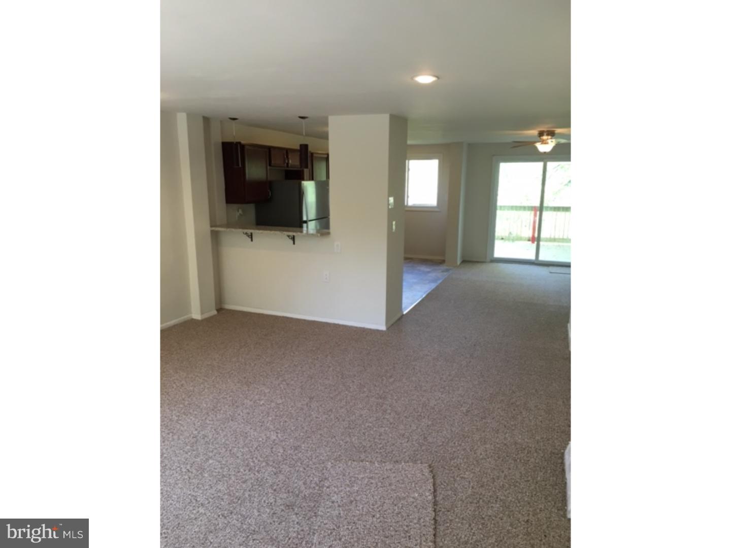 1341 Rainer Road Brookhaven, PA 19015 - Photo 4 of 23 a view of a living room with furniture and a window