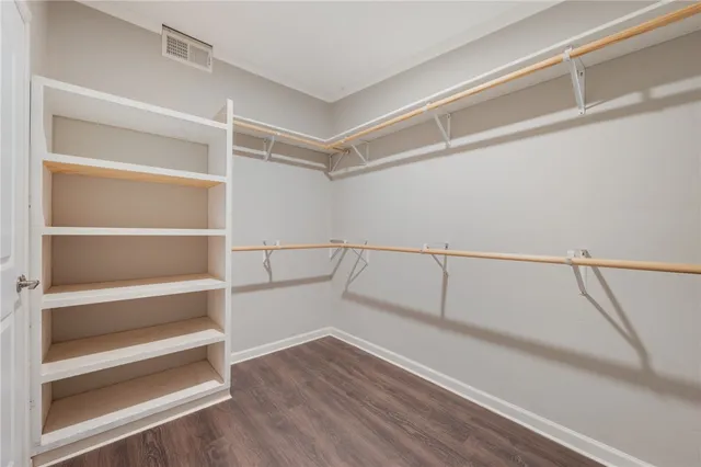 a view of an empty walk in closet