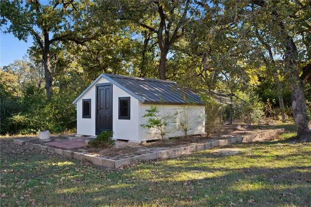 a house view with a garden space