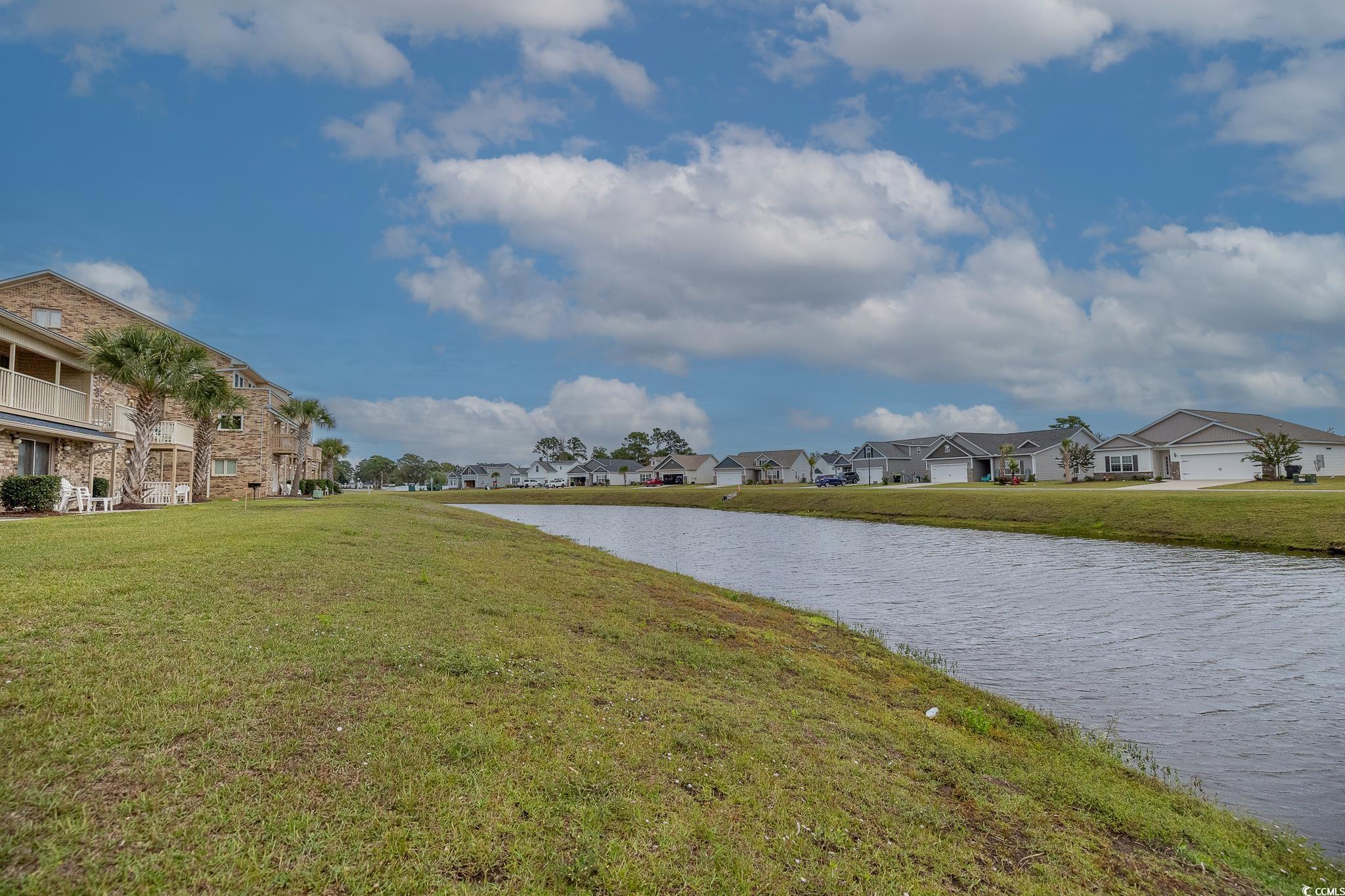 209 Double Eagle Drive, Unit F2 Surfside Beach, SC 29575 - Photo 4 of 17 Water view featuring nearby suburban area
