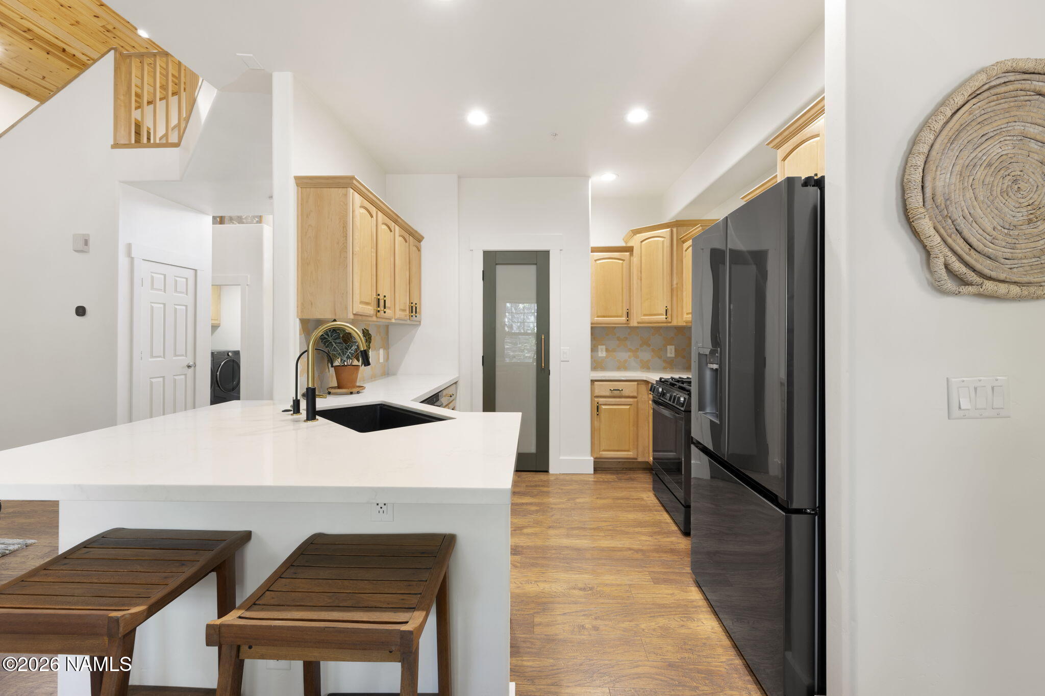 3495 West Lead Rope Flagstaff, AZ 86005 - Photo 19 of 49 a kitchen with a table and chairs