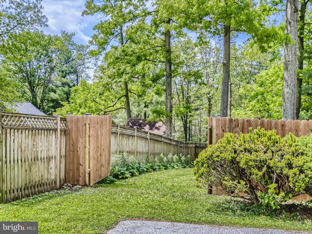 7732 Carter Road Sykesville, MD 21784 - Photo 20 of 27 Large driveway. Fence opens for larger vehicles.
