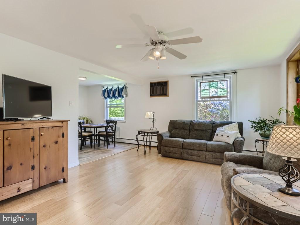 7732 Carter Road Sykesville, MD 21784 - Photo 6 of 27 Large living area leading to dining room.