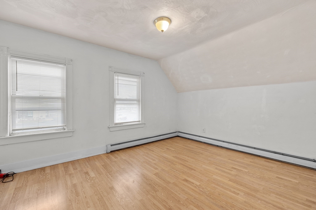 75 Plain Street Lowell, MA 01851 - Photo 11 of 17 an empty room with window