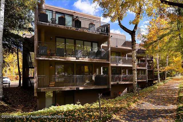 front view of a house with a small yard