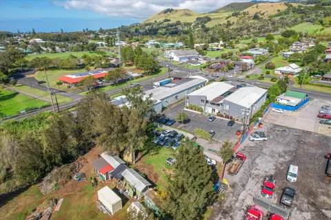 a view of a garden with houses