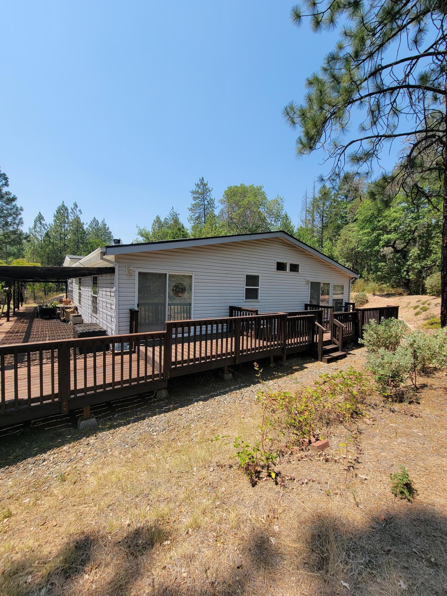 2599 Chapman Creek Road Cave Junction, OR 97523 - Photo 40 of 50 Back deck/back side of house