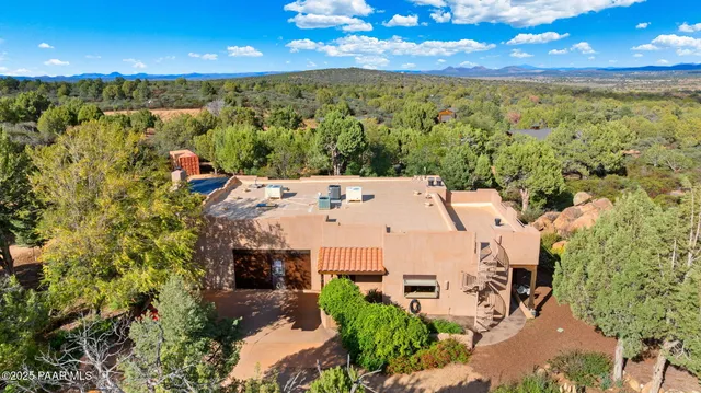 a view of a car parked in front of a building