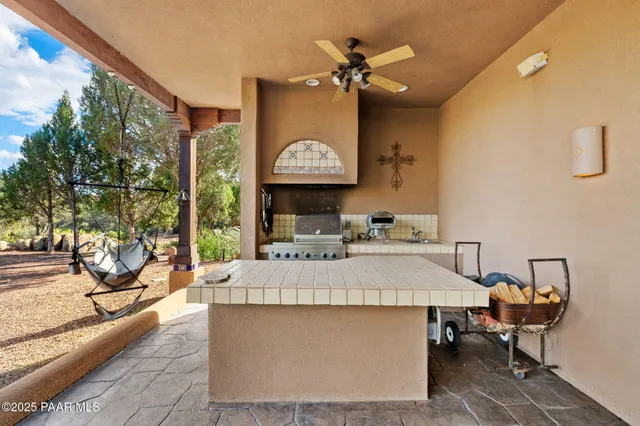 an aerial view of a house with a yard and garden