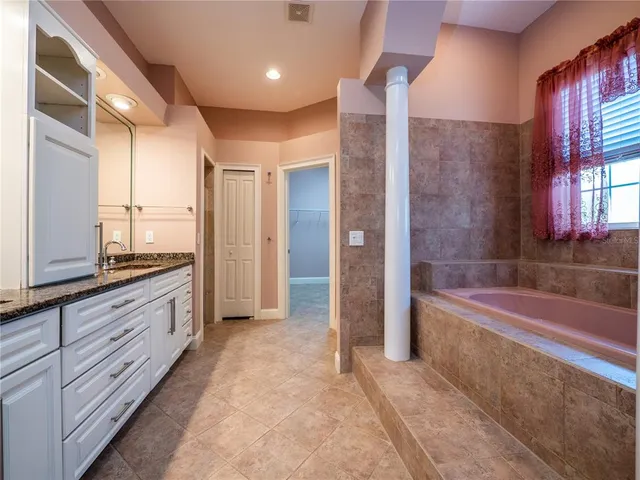 a view of a bathtub in a room