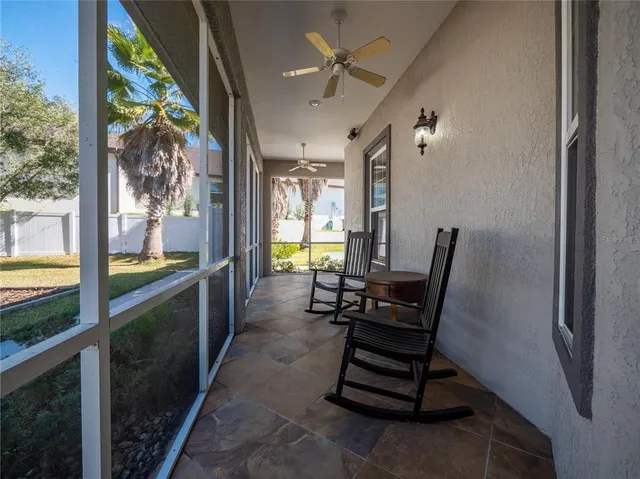 a view of a porch with seating space