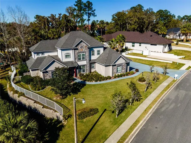 a view of a swimming pool with seating area
