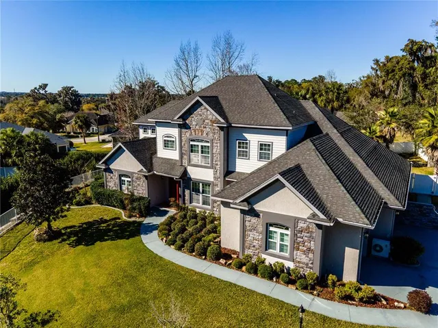 a view of swimming pool with chairs