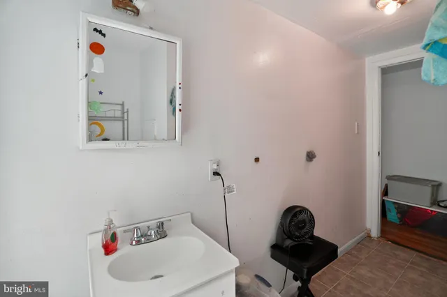 a bathroom with a sink and a vanity