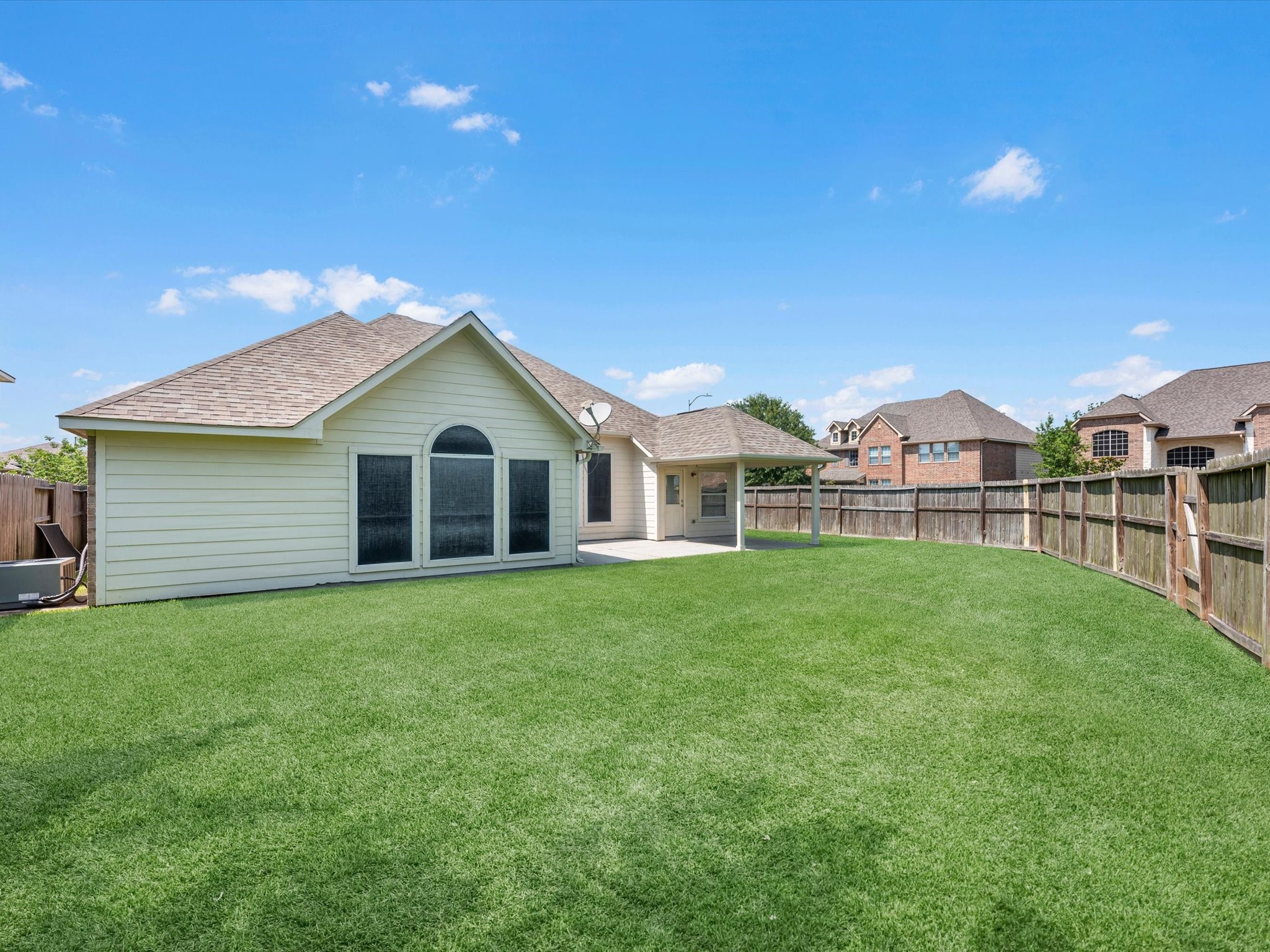 5122 Dripping Spring Avenue Baytown, TX 77523 - Photo 5 of 33 Ample space in both front and back yards.
