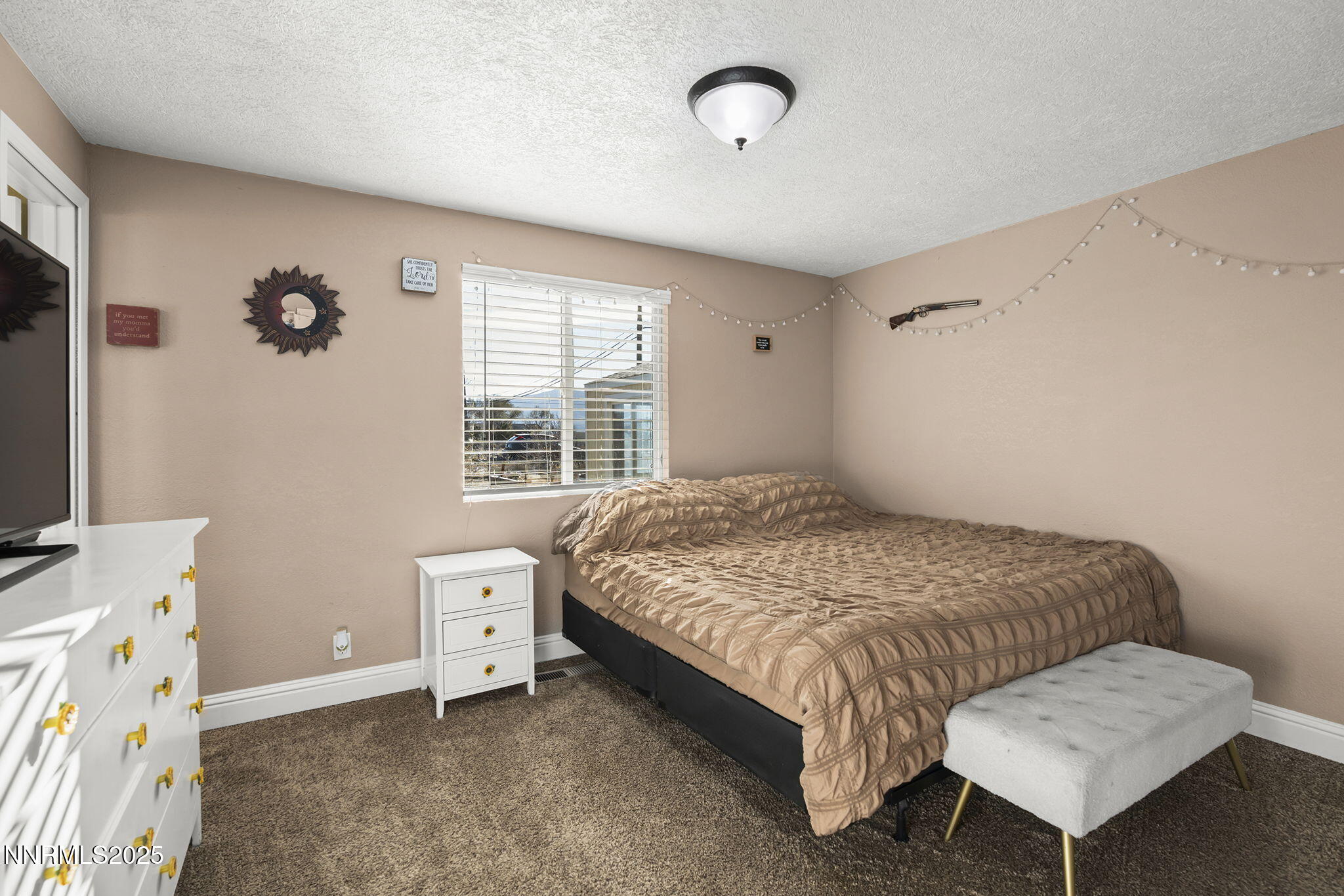 11600 Tupelo Street Reno, NV 89506 - Photo 11 of 23 a bedroom with a bed and a window