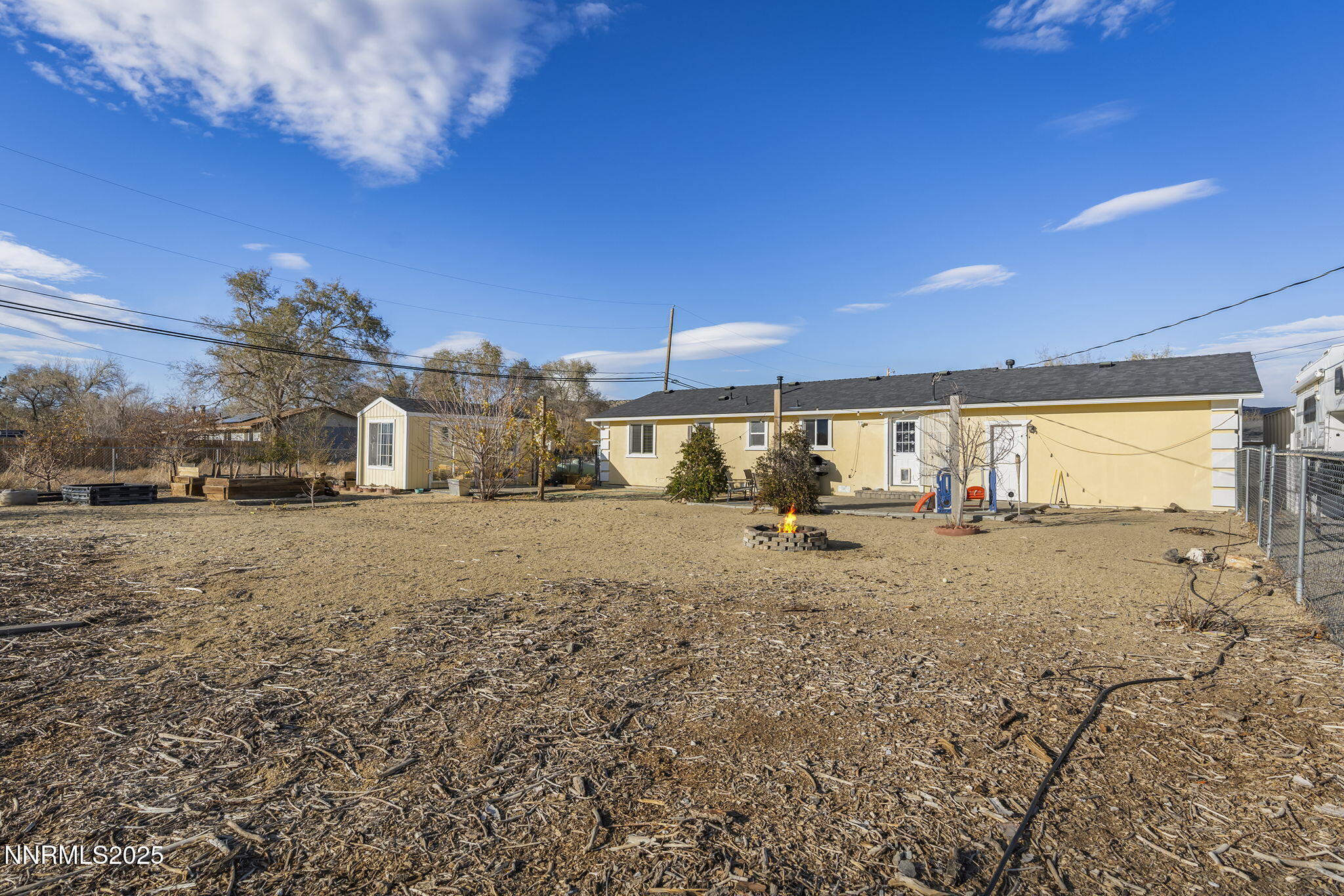 11600 Tupelo Street Reno, NV 89506 - Photo 18 of 23 a view of a house with a yard