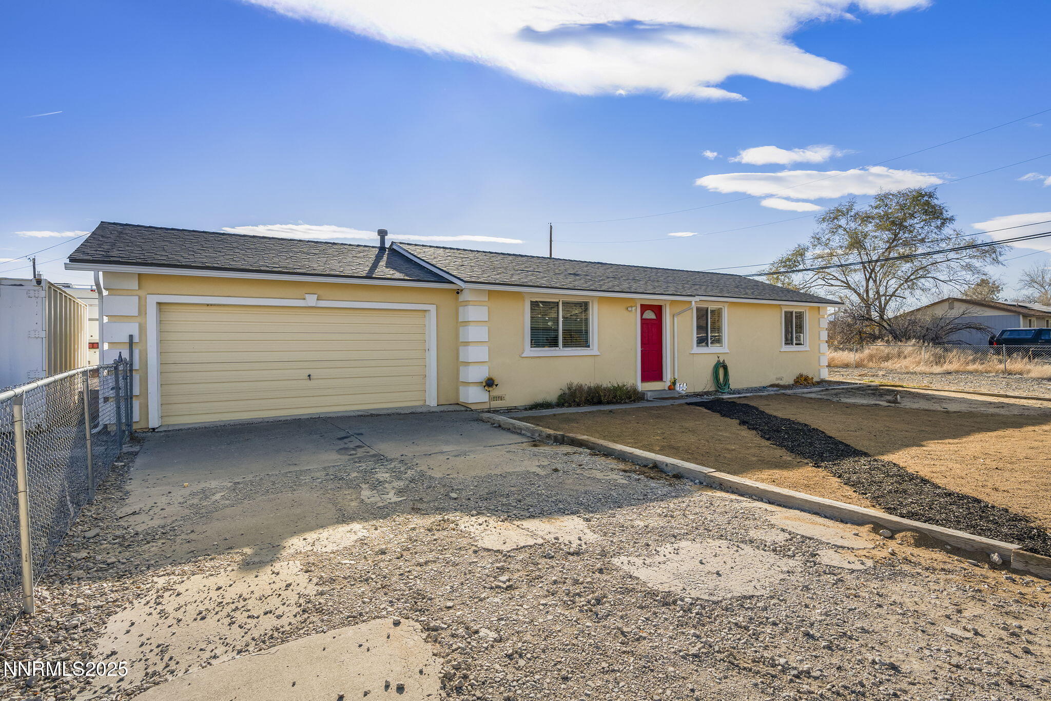 11600 Tupelo Street Reno, NV 89506 - Photo 2 of 23 a view of garage and deck