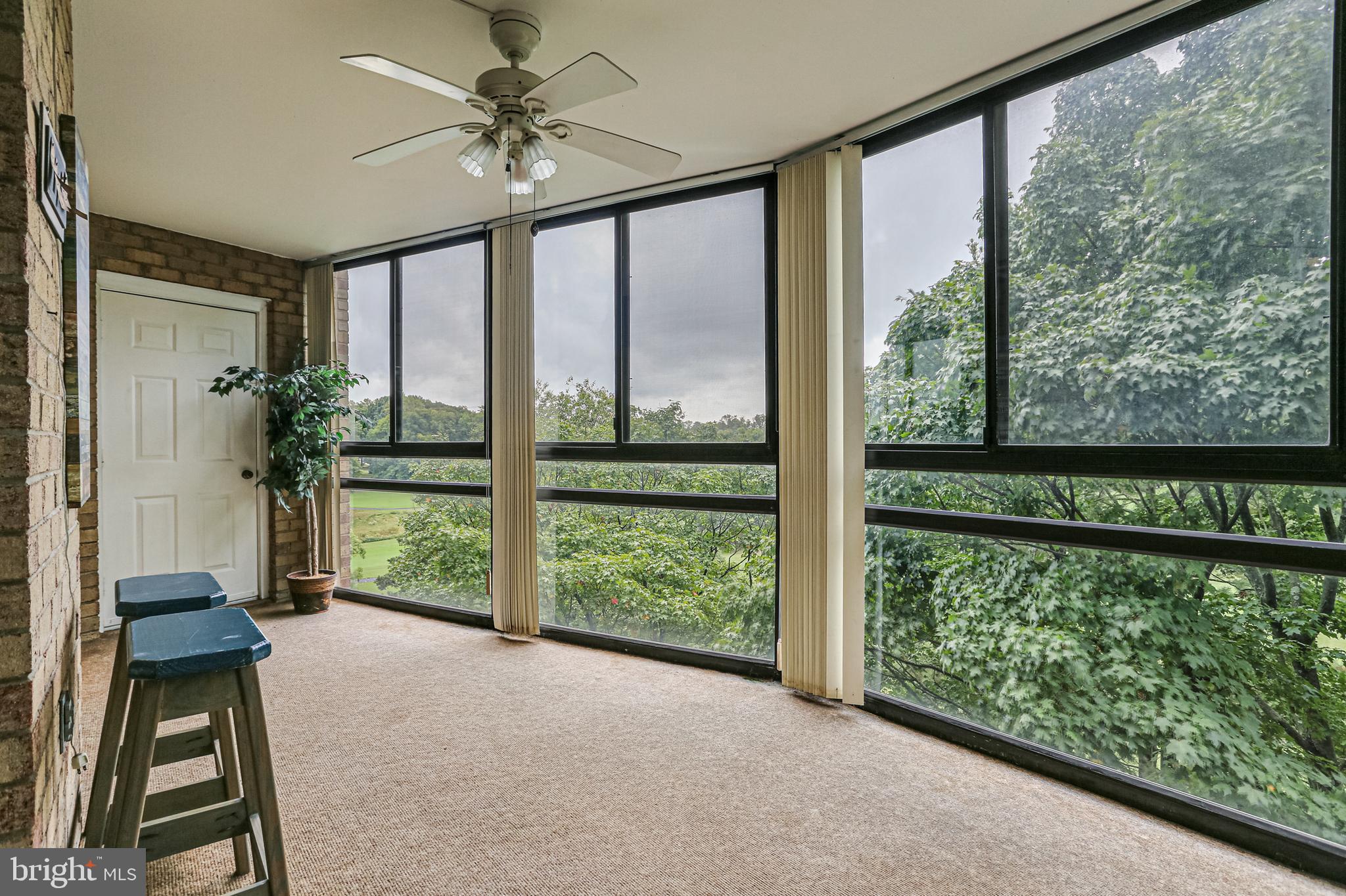 15101 Interlachen Drive, Unit 1504 Silver Spring, MD 20906 - Photo 17 of 37 Views from sunroom