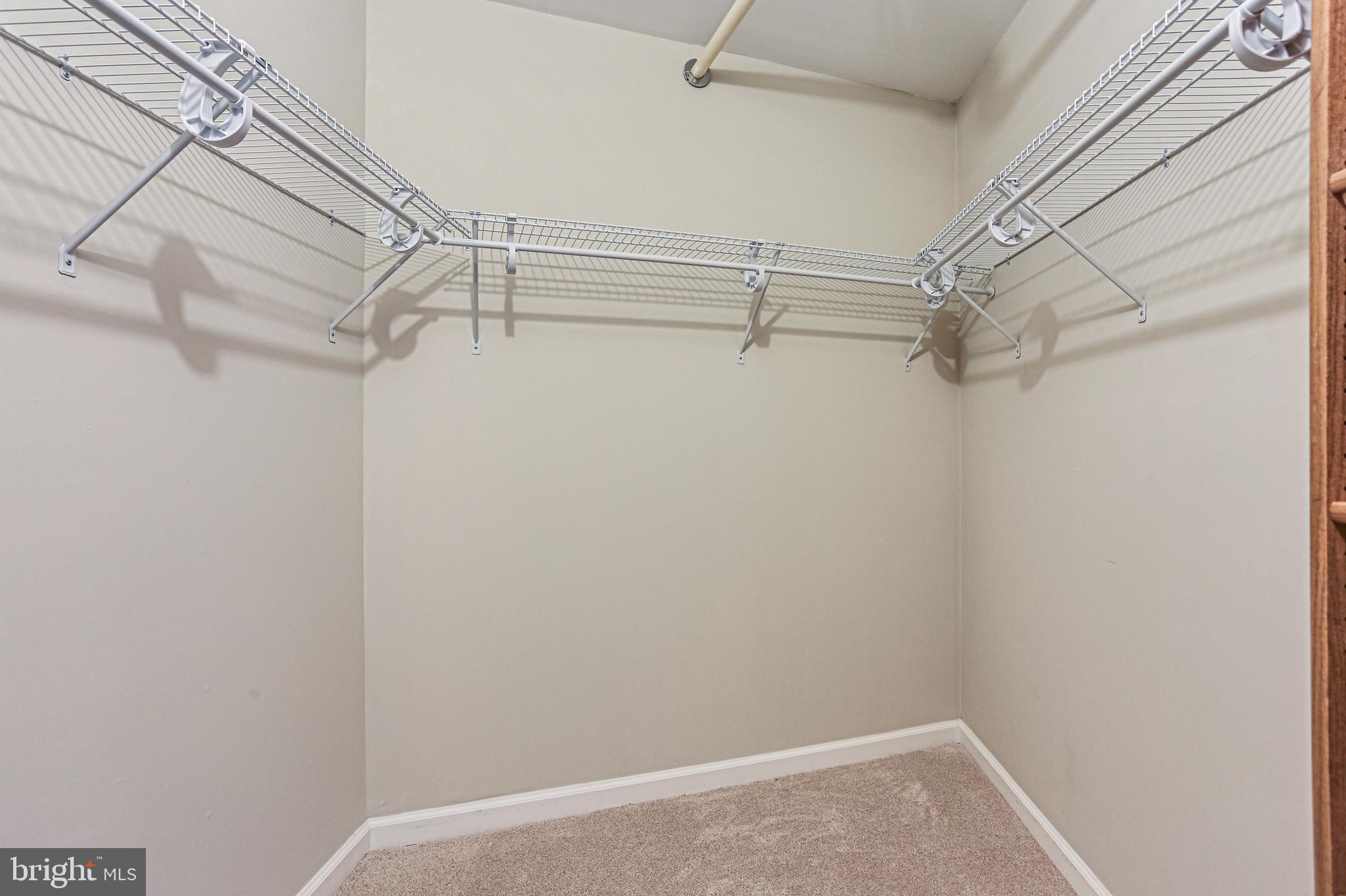 15101 Interlachen Drive, Unit 1504 Silver Spring, MD 20906 - Photo 27 of 37 Primary walk-in closet