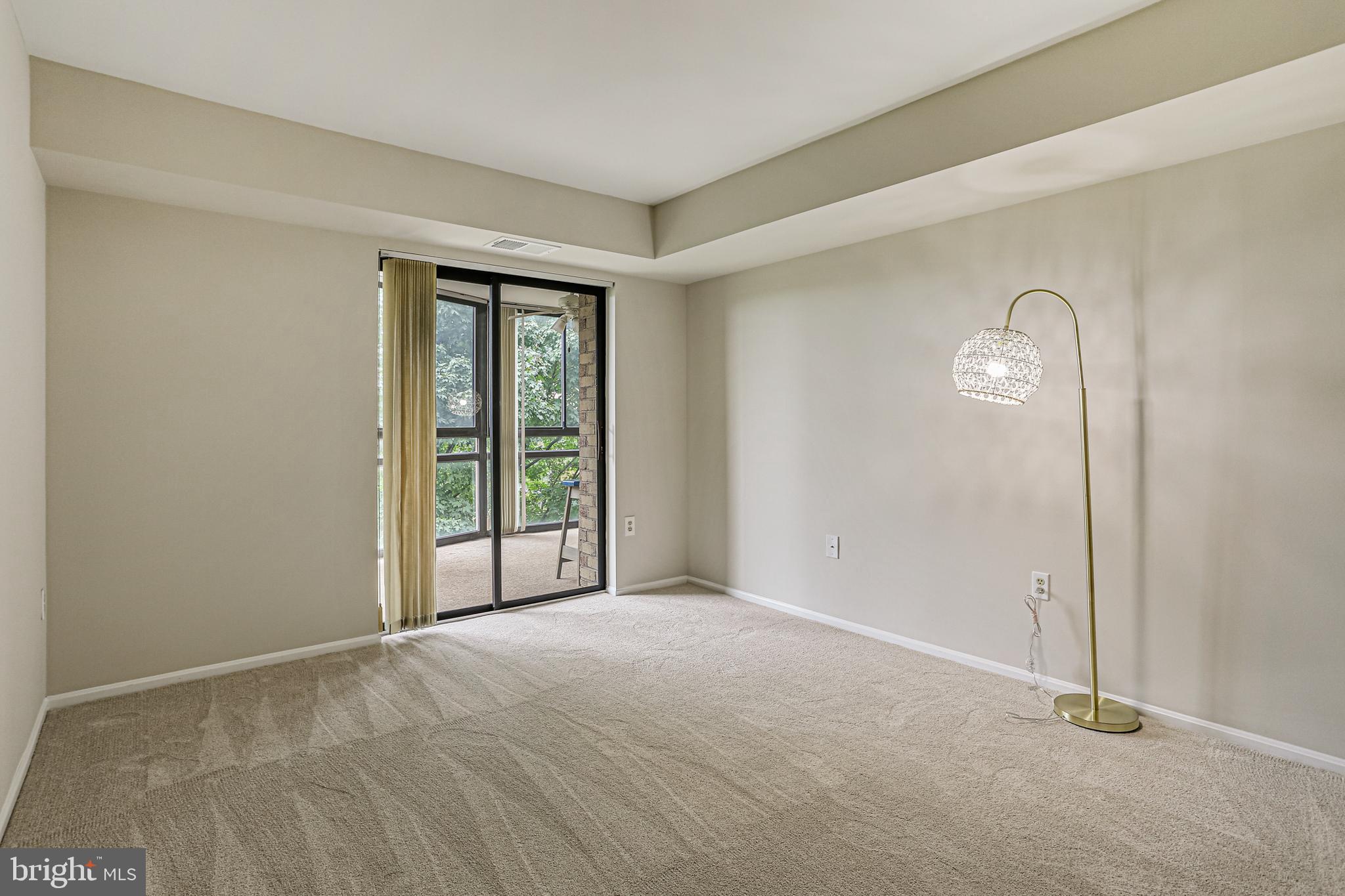 15101 Interlachen Drive, Unit 1504 Silver Spring, MD 20906 - Photo 30 of 37 Secondary bedroom with access to sunroom