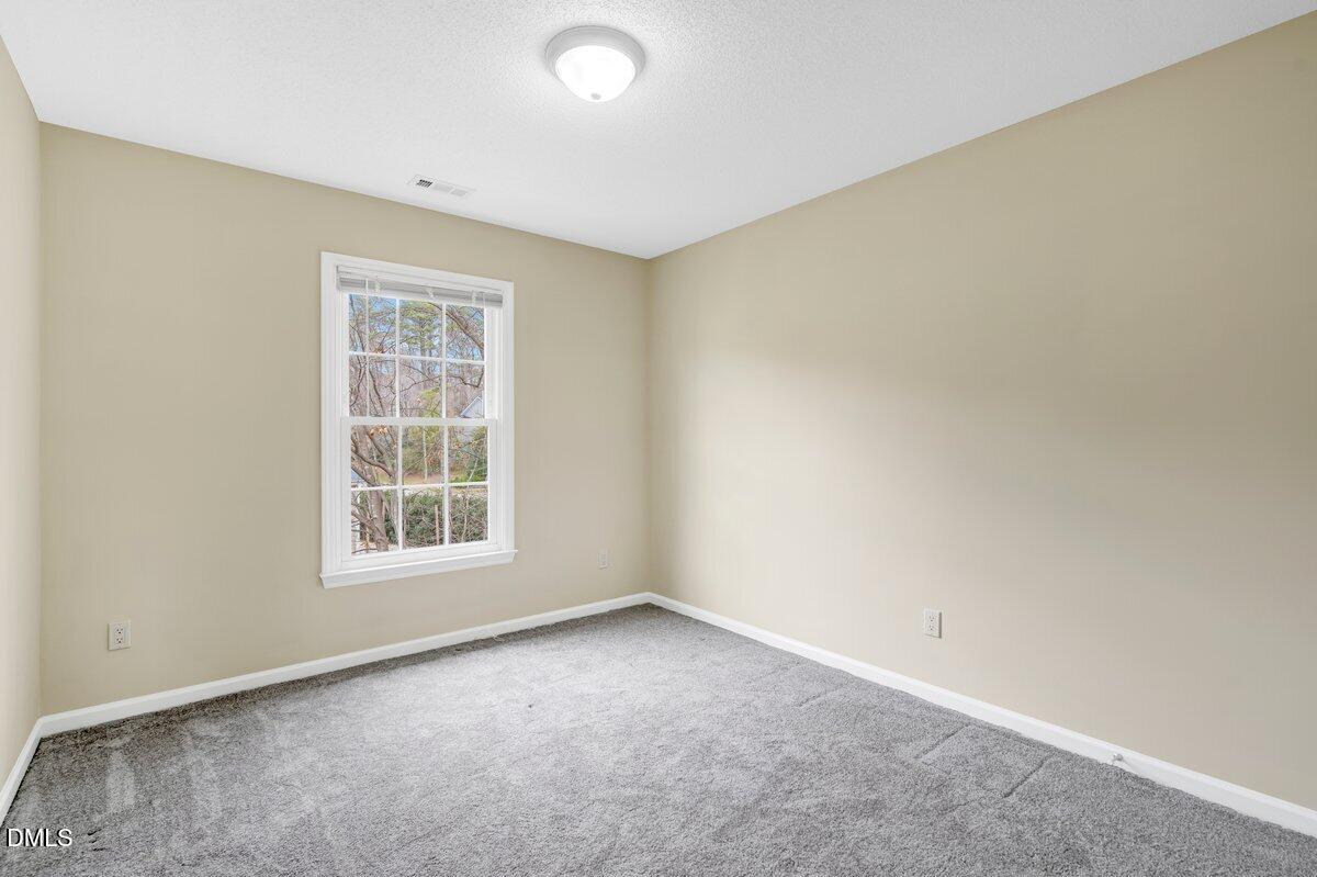 103 Springberry Court Cary, NC 27518 - Photo 25 of 37 Bedroom 1