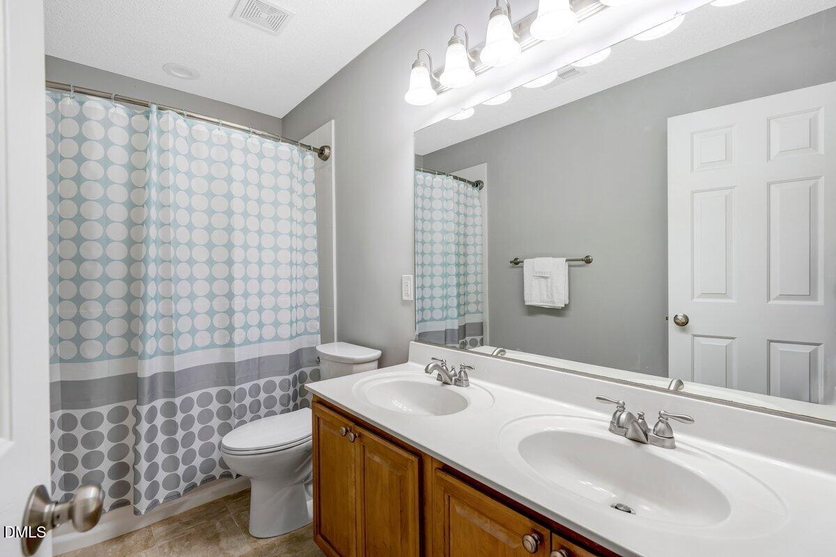 103 Springberry Court Cary, NC 27518 - Photo 30 of 37 Secondary Bathroom