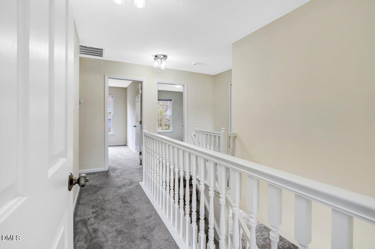 103 Springberry Court Cary, NC 27518 - Photo 31 of 37 Upstairs Hallway