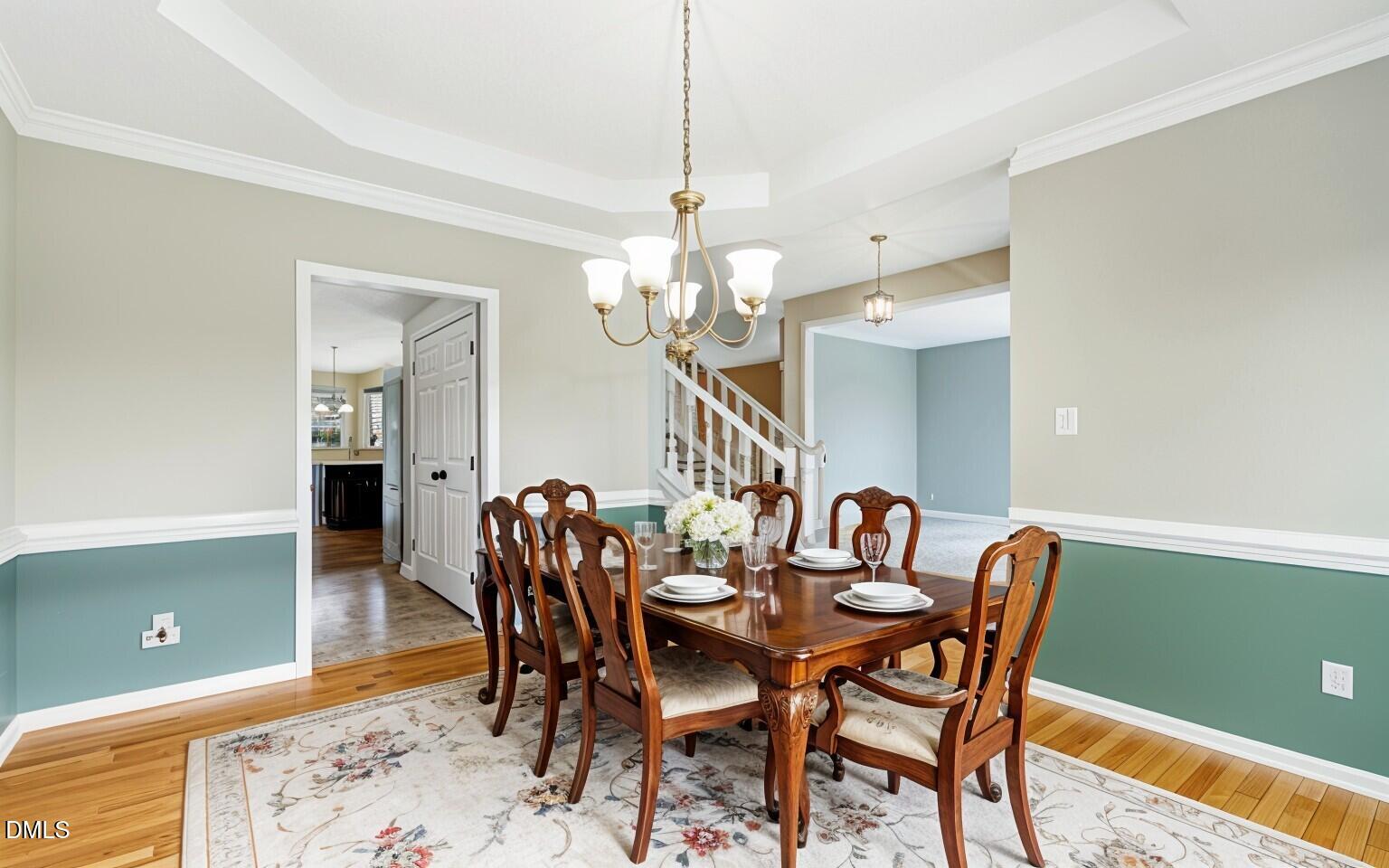 103 Springberry Court Cary, NC 27518 - Photo 8 of 37 Dining Room Digitally staged